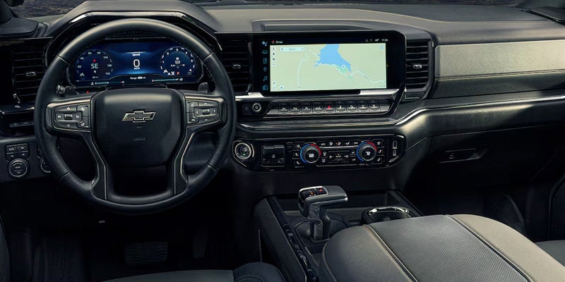 The inside of a 2025 Chevrolet Silverado 1500, showcasing the dasbboard